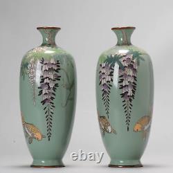 A Pair of Vases with Wisteria flowers and Goldfish on green cloisonné enamel