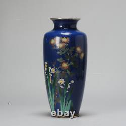 A Small Vase with flowers on blue cloisonné enamel Meiji era (1868-1912)