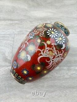 An Antique Japanese Cloisonne Floral Red Ground Decorated Vase